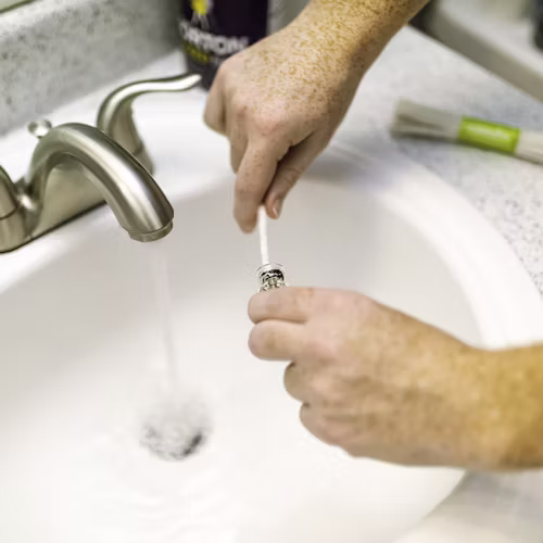 prevent shower drains from clogging